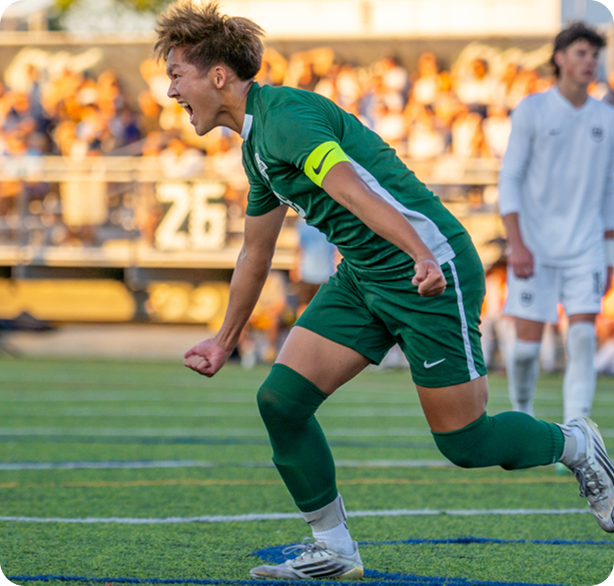 Young men playing soccer